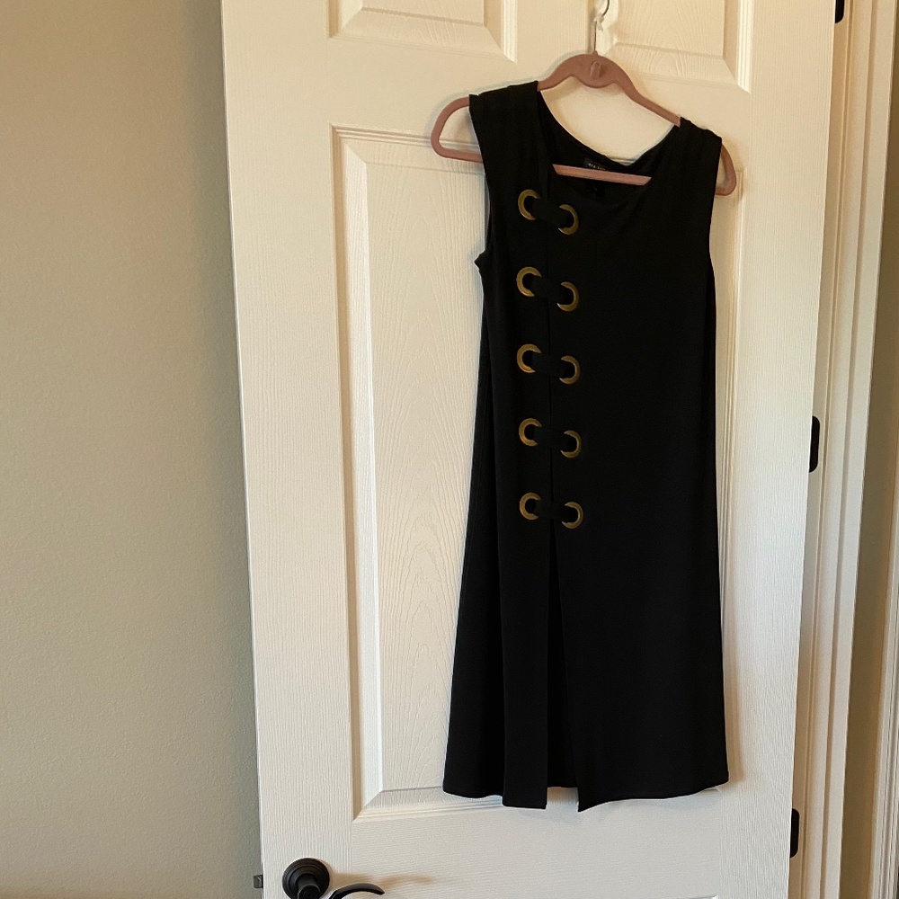 eva varro black grommet dress, lined with split at front.  Size  M,